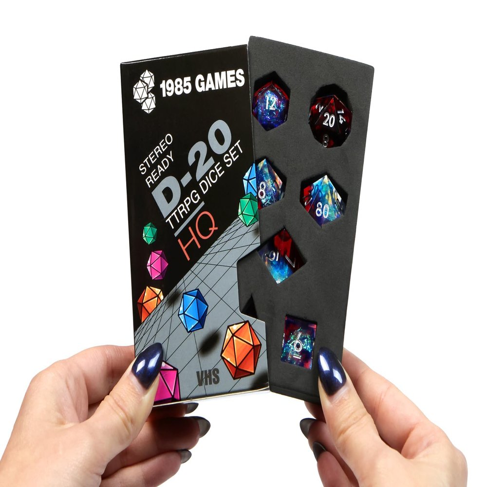 1985 Games Sharp Edge DND Dice Set  Plasmic Punch Polyhedral Dice in Retro VHS Box  TTRPG Dice Set  Tabletop RPG Accessory (Set of 7)