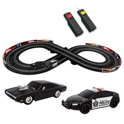 Fast and Furious : Speed Chase Racetrack Slot Car Set - Officially Licensed, 38' x 18.5' Track Layout, Two 1:43 Replica Cars, Two Player Race Controllers, Eight Figure Track, Ages 3+