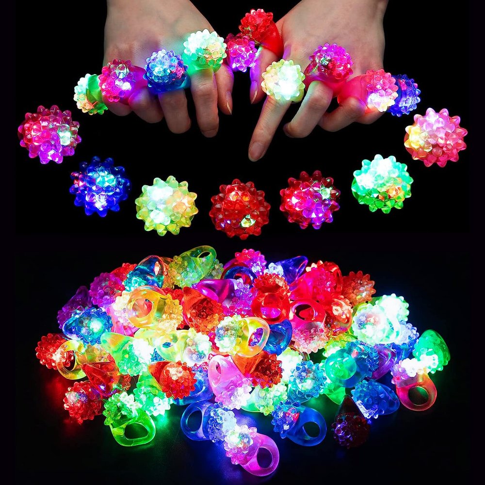 CCINEE 28Pcs Light Up Rings Flashing Colorful LED Rubber Bumpy Jelly Rings Glow in Dark Finger Toys for Party Supplies Prizes Novelty Gifts Party Bag Filler