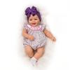 The Ashton-Drake Galleries Lifelike Reborn Norah Baby Doll, 17 inches, Handcrafted RealTouch Vinyl Collectible by Ping Lau, Purple Bow view 1