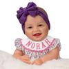 The Ashton-Drake Galleries Lifelike Reborn Norah Baby Doll, 17 inches, Handcrafted RealTouch Vinyl Collectible by Ping Lau, Purple Bow view 2