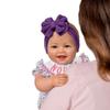 The Ashton-Drake Galleries Lifelike Reborn Norah Baby Doll, 17 inches, Handcrafted RealTouch Vinyl Collectible by Ping Lau, Purple Bow view 4