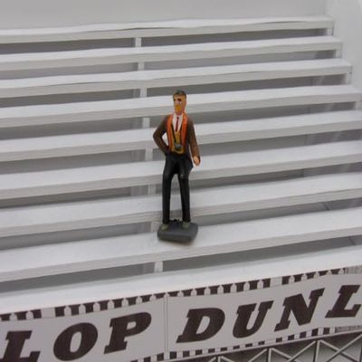 F822 Greenhills Seated Male Spectator for Scalextric Carrera 1.32 Scale - NEW