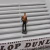 F822 Greenhills Seated Male Spectator for Scalextric Carrera 1.32 Scale - NEW view 1