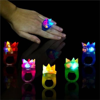 Pack of 4 Light-Up Flashing Novelty Rings Club Rave Birthday Party Favors Jelly LED Glow-In-The-Dark Neon Bag Stuffers Colorful Rubber Rings, Multi-Color Spikey