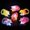 Pack of 4 Light-Up Flashing Novelty Rings Club Rave Birthday Party Favors Jelly LED Glow-In-The-Dark Neon Bag Stuffers Colorful Rubber Rings, Multi-Color Spikey view 2