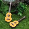 Healifty 2PCS Miniature Guitar Model for Dollhouse 1:12 Scale Wooden Base Guitar Mini Musical Instrument Photo Props Doll House Model Home Decor view 4