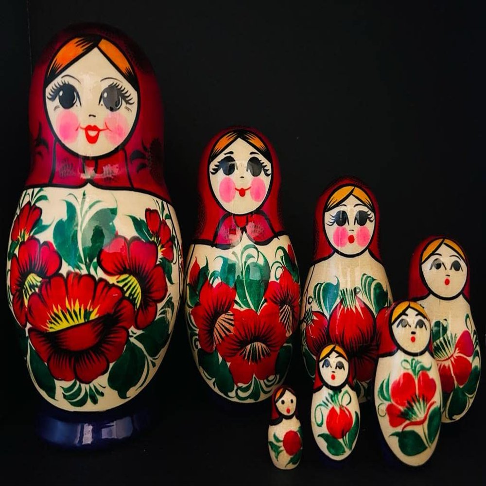 RUSARG 7-Piece Authentic Russian Matryoshka Nesting Dolls - Hand-Painted Traditional Design with Vibrant Colors.