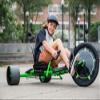 Huffy Green Machine 20 Inch Drift Trike, Sleek Ergonomic Design, Adjustable Seat, Durable Steel Frame, Easy to Operate, Drift Trike for Kids Ages 8+, LED Light Accents, Coaster Brake, Green and Black view 2