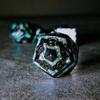 Sage's Portal Dimension Stones Metal DND Dice 7 Piece Polyhedral Dice Set for DND TTRPG Dungeons and Dragons Pathfinder Oversized Designer Dice (Gloss Black/Aquamarine) view 4