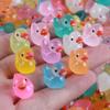 100pcs Luminous Mini Ducks,15 mm Dollhouse Dcor Resin Ducks Glow in The Dark for Aquarium Decor Micro Fairy Garden Landscape Hide,Seek Party Toys,Craft Making and Ornament Scrapbooking (Multicolour) view 1