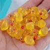 100pcs Mini Resin Duck,15 mm Dollhouse Dcor Resin Ducks Glow in The Dark for Aquarium Decor Micro Fairy Garden Landscape Hide,Seek Party Toys,Craft Making and Ornament Scrapbooking (Yellow) view 1