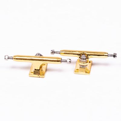 Exodus Stage III Fingerboard Trucks (34mm Gold)