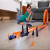 Hot Wheels Toy Car RC Set with 1:64 Scale Remote-Control Vehicle & 30+ Pieces of Race Track to Create Multiple Configurations view 2