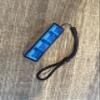 Four-Button Clicky Mechanical Switch Fidget Toy | Stim Toy, Stress Relief, ADHD (Black Base, Transparent Blue Keycaps) view 2