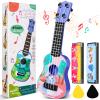 Mini Guitar 10 Inch Musical Toy Guitar Classical Toddler Ukulele with 2 Extra Mini Harmonica 16 Holes and 2 Kids Party Favor (Dinosaur) view 1