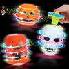 DERAYEE Halloween Basket Stuffers for Kids, 3PCS LED Pumpkin Skull Light Up Spinning Tops Halloween Spinning Toys Gifts for Halloween Party Favors Goodie Bag Fillers Classroom Rewards view 1