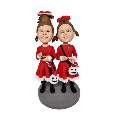 WobblePals Christmas Holiday Decoration Two Girl Figurines in Red Dresses with Candy Canes 6 inches Toy for Private Collectibles Sculpture Handmade Clay Figurine