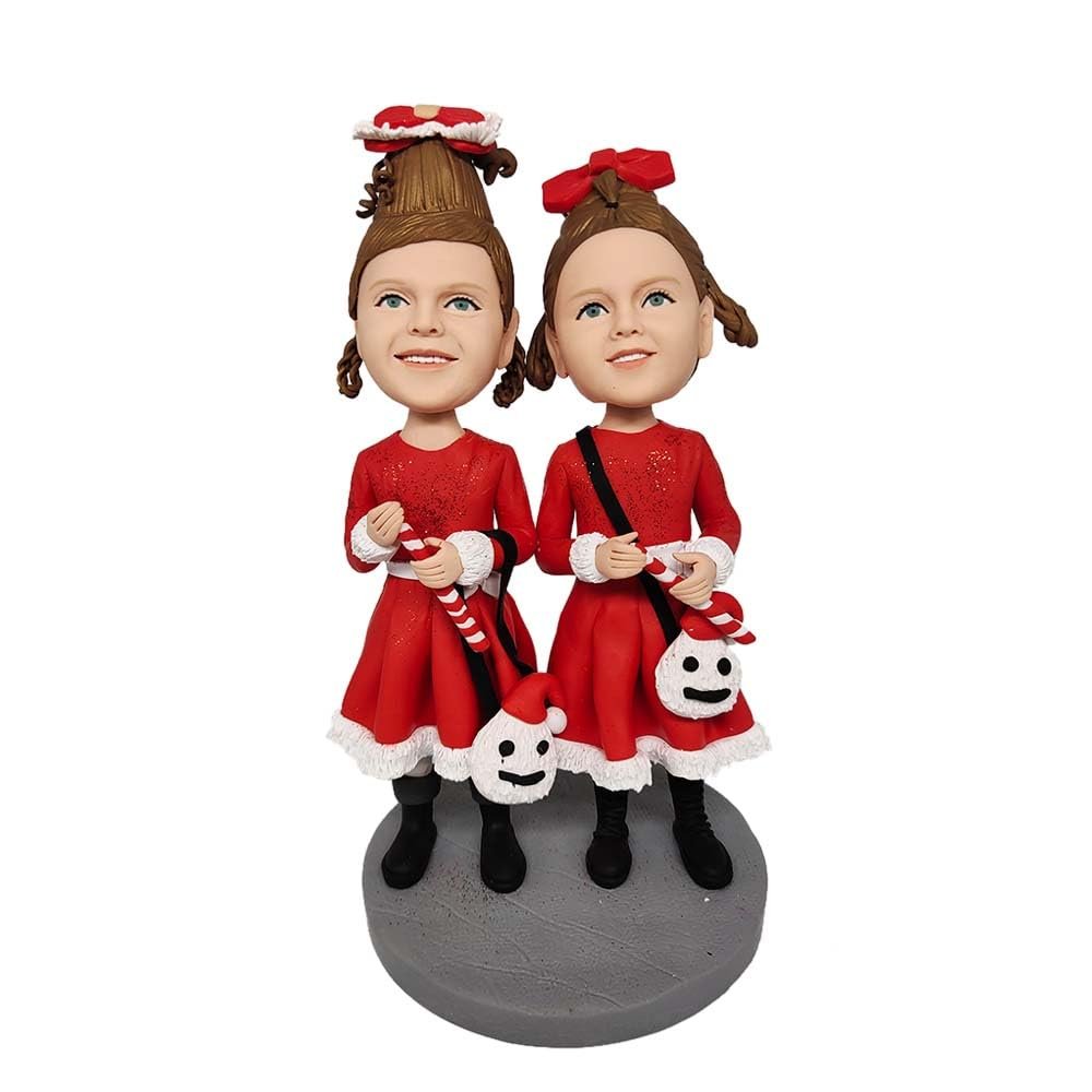 WobblePals Christmas Holiday Decoration Two Girl Figurines in Red Dresses with Candy Canes 6 inches Toy for Private Collectibles Sculpture Handmade Clay Figurine