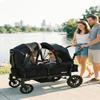 INFANS Wagon Stroller for 2 Kids, Collapsible Adjustable Push Pull Handle Bar, 2 Seater Stroller Wagon with Removable Canopy Snack Tray, Comfortable Drop-Down footwell and Upholstered Seats view 2