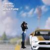1/64 Scale Female Photographer Figure, Photo-Taking Female Figure - Dressed in Black Coat, Jeans and Boots, Standing Taking Photo Girl Figurine, Capturing Moments with Camera Figure Mini Statue view 2