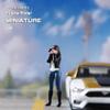 1/64 Scale Female Photographer Figure, Photo-Taking Female Figure - Dressed in Black Coat, Jeans and Boots, Standing Taking Photo Girl Figurine, Capturing Moments with Camera Figure Mini Statue view 3