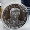 1 oz silver Trump 45 & 47 Presidential Medal Portrait in capsule view 3