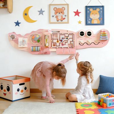 JOYMOR Crocodile Activity Wall Busy Board Panels, Wooden Sensory Wall w/ 11-in-1 Toddler Montessori Learning Activity Center, Ideal Educational Gift for Boys and Girls, Pink