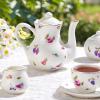 TUZT Tea Party Set for Little Girls Ages 3-8, White Floral Porcelain Tea Set with Gold Trim Edges, Princess Tea Time Toy Includes Pot & Cups & Saucers & Suitcase, Birthday Gifts for Toddlers Girls view 3