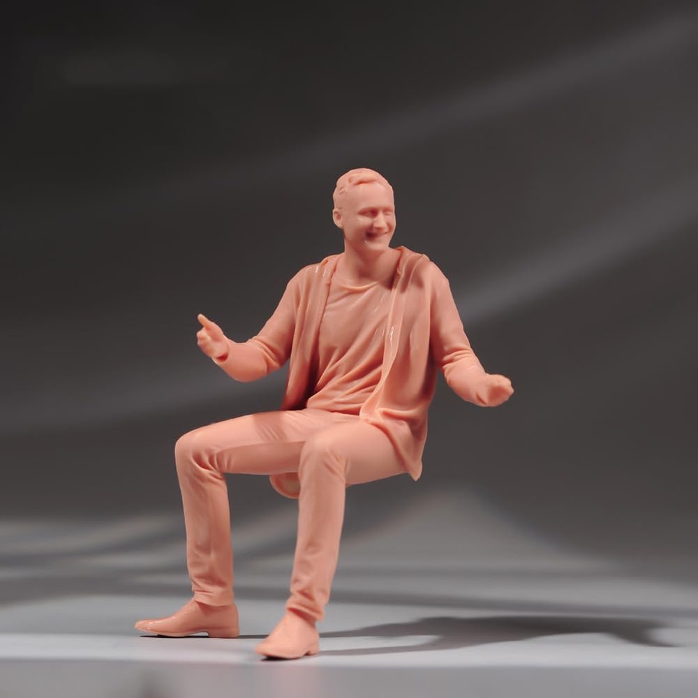1/18 to 1/87 Scale Sitting Man Figure in Cozy Pose, Smiling Male Figure in Casual Attire - Seated Pose with Folded Legs & Relaxed Arms, Perfect for Collectors, Dioramas, & Home Decor (unpainted, 1/24)