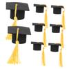 FOYTOKI 8pcs Graduation Cap Cake Toppers Tassels for Graduation Party Decorations Hat Picks for and Desserts for Celebrating Graduates view 1
