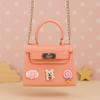 Peachy Pink Mini Kids Purse  Glossy Trapezoid Handbag with Fun Bear & Candy Charms view 3