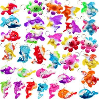 100 Packs Bulk Fidget Bubble Bulk Mini Pop Fishs Octopus, whales, dolphins, turtles, sharks Ocean shape Keychain , Holiday Party Favors Sea Animal Supplies Classroom summer Student gifts