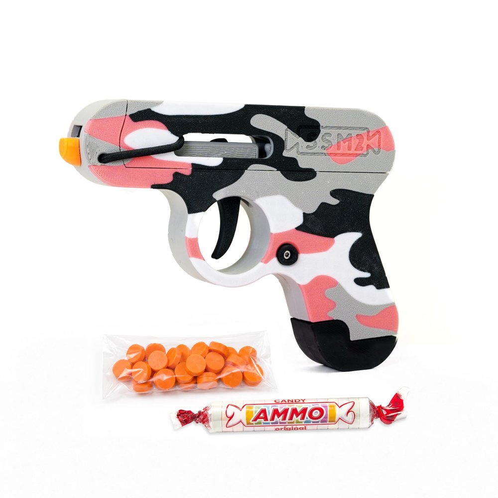 Toy Gun that Shoots Candy - The Smartee Shooter - Shoots Fast and Far - Over 40 feet & Over 70 fps. Working Magazine & Slide. 5 Packs of Candy & 20 Pieces of Plastic Ammo. (Pink Camo)