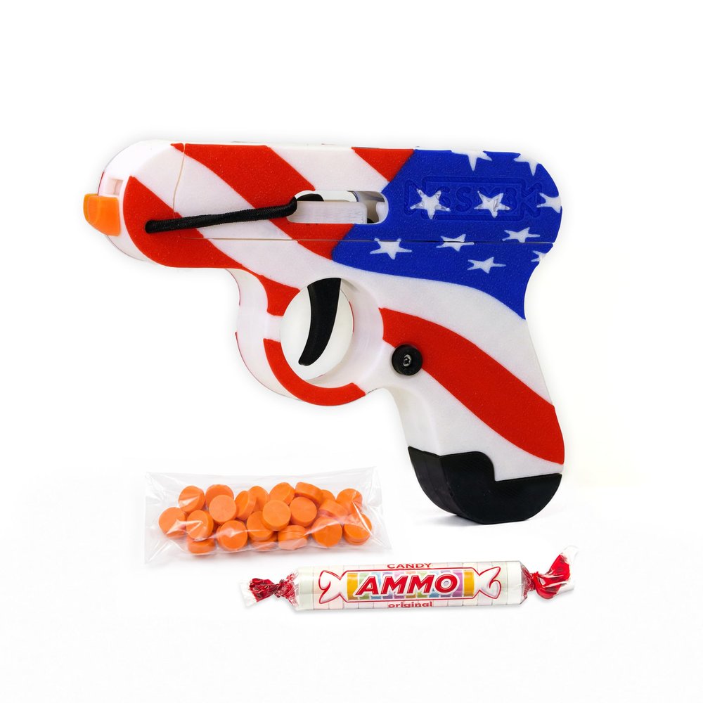 Toy Gun that Shoots Candy - The Smartee Shooter - Shoots Fast and Far - Over 40 feet & Over 70 fps. Working Magazine & Slide. 5 Packs of Candy & 20 Pieces of Plastic Ammo. (American Flag)