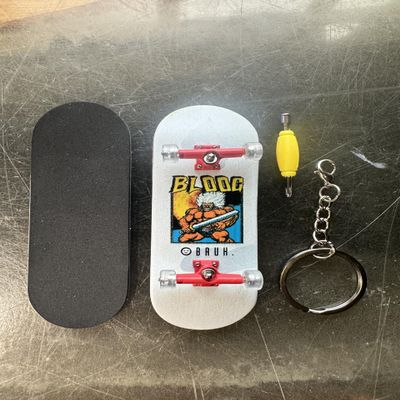 BRUH. 34mm Complete  Bloog  5-Ply Wooden Deck, Foam Grip, Metal Trucks + Keychain & Tool  Pro Finger Board for Tricks (White)