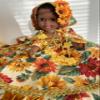 15-inch Decorative Doll in Sunflower Print Dress with Gold Trim and Floral Crown, Yellow and Red view 3