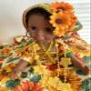 15-inch Decorative Doll in Sunflower Print Dress with Gold Trim and Floral Crown, Yellow and Red view 4
