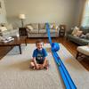 15 Ft Flexible Race Track for Kids, Dual-Sided Car Tracks with 2 Lanes for Racing & 1 Wide Lane for Big Cars, Compatible with 1:64 Scale Model Cars, 4 Toy Cars Included, Easy Roll Up for Storage view 2