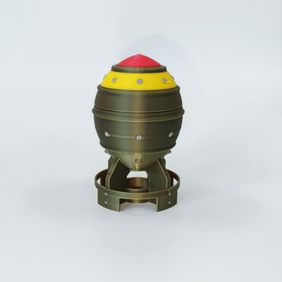 3D Printed Desktop Decorative Bomb Model, Military Green with Yellow and Red Accents, 3.15 x 1.97 inches