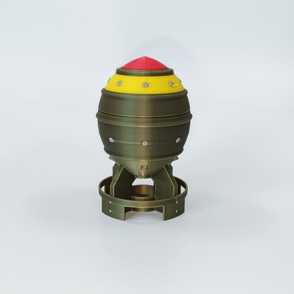 3D Printed Desktop Decorative Bomb Model, Military Green with Yellow and Red Accents, 3.15 x 1.97 inches