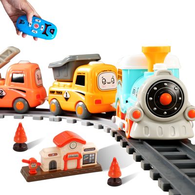 SIGHTEEDA Steam Train Set for Toddlers  Cartoon Face Locomotive with Remote Control, Real Steam, Lights & Music  Magnetic Toy with Tracks & Trucks