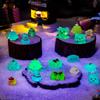 100Pcs Mini Christmas Luminous Figurines, Glow in The Dark Christmas Resin Miniatures Xmas Tree Santa Claus Snowman Reindeer Duck Design for Party Favors Bag Fillers Garden Dollhouse Decor  view 3