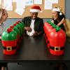 Arrowbash 12 Sets Christmas Gift Bucket Game Include Plastic Santa Belt Buckets with Handles Stress Ball Dice Garland Dart Pen Red and Green Balloons for Christmas Decorations Holiday Supplies view 4