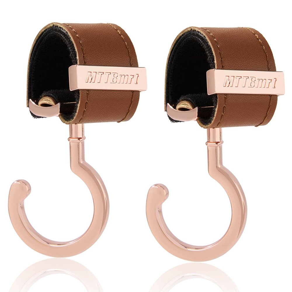2 Pack Stroller Hooks,Strong Synthetic Leather Hook-and-Loop Fastener&High-Quality Metal Hooks,Universal Bag Clip|360 Rotation, 66lb Capacity,Non-Slip-Fits Wheelchair(Brown-Pink Gold)