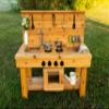 Noble Toys XL Cedar Outdoor Mud Kitchen Centered with Backsplash, Working Faucet and Oven for Toddlers Kids | Pretend Play Table | Sensory Table | Outside Playset | Real Wooden Kitchens | Preschool view 3