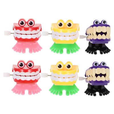BRIGHTFUFU 6pcs Halloween Wind-up Walking Teeth with Jumping Eyes Funny Plastic Novelty for Adults Portable Party Favors for Halloween Birthday Carnival Celebration