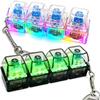 2 Pack Keyboard Fidget Keychain with LED Lights,Keyboard Fidget Toy,Keyboard Button Finger Clicker for Anxiety Relief(Transparent) view 1