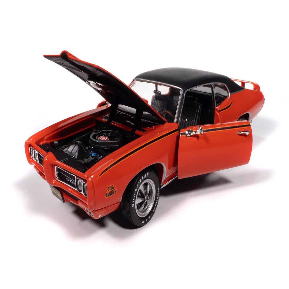1969 GTO Judge Carousel Red with Black Stripes and Black Vinyl Top Mecum Auctions American Muscle Series 1/18 Diecast Model Car by Auto World AMM1351