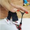 SelHeng 2Pcs Red Mini Finger Scooter, Cute Mini Skateboards Plastic Finger Skateboards Finger Sport Interactive Photography Props Finger Boards and Finger Bikes Random Red view 2